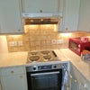 Photo 4: Kitchen hob, oven and microwave