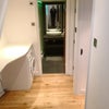 Photo 11: Split-level apartment with illuminated glass balustrade on stairs