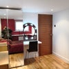 Photo 16: Bedroom 2 - desk / dressing table with illuminated mirrors, double bed, and ample storage