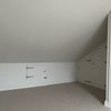 Photo 2: One end of the converted attic space that could be used as an office or separate living space