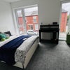 Photo 4: Bed equipped with new mattress and two storage drawers. Also a study desk. 