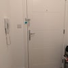 Photo 2: entrance door with video call bell