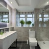 Photo 7: Bathroom features a large walk in shower