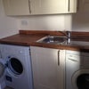 Photo 4: Utility with washer and dryer