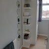 Photo 3: Wardrobe and open shelving 