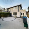 Photo 8: Front-side view of the Wimbledon Property with parking access