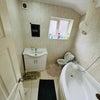 Photo 7: Bathroom Featuring a Relaxing Bathtub / Vanity / Washbasin
