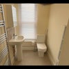 Photo 3: One of two modern bathrooms