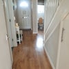 Photo 2: Front hallway wall 