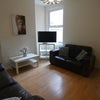 Photo 2: Shared living room with smart tv