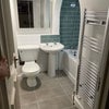 Photo 4: Lower Floor Full Bathroom