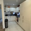 Photo 5: Kitchen with Built-in Fridge, Dishwasher, Electric Hob, Microwave and Microwave