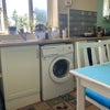 Photo 5: Washing machine. Kitchen has been now been renovated.