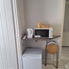 Photo 3: Shared microwave fridge kettle 
