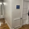Photo 3: Hallway featuring one of my canvases