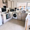 Photo 6: Shared downstairs kitchen