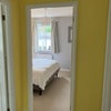Photo 6: The bedroom from the hallway