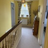 Photo 7: The hallway from the bedroom.