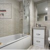 Photo 4: Main Bathroom (1st Floor)
