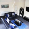 Photo 5: The lounge includes a 50" TV with Freeview