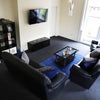 Photo 12: The lounge opens out to a large south facing garden