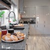 Photo 6: Communal Kitchen and Living Area