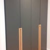 Photo 7: Storage cupboard in dressing room