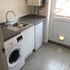 Photo 3: Own kitchenette, with fridge freezer, washing machine, and electric hob.