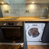 Photo 3: Washer/dryer and oven
