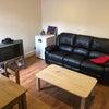 Photo 5: Spacious and inviting living room with comfortable seating and a stylish dining area.