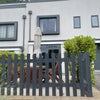 Photo 2: The house from the outside, is on a private quiet street