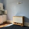 Photo 7: Room 14 - kitchen and dining area (the table opens out to seat four, and contains four folding dinin