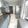 Photo 4: Kitchen with stainless steel work surfaces