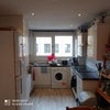 Photo 6: Modern eat in kitchen