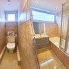 Photo 10: Modern bathroom and separate toilet
