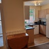 Photo 7: Kitchen with dishwasher and larder fridge