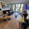 Photo 3: Living room with entertainment system