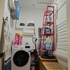 Photo 5: Separated Laundry and drying room 