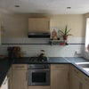 Photo 4: the kitchen with fridge freezer, gas hob, electric cooker and new washing machine.