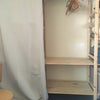 Photo 9: Big ikea wooden shelving unit x 3 bays plenty of space to store things and has space for clothes.