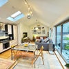 Photo 1: Open-plan kitchen/livingroom