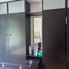 Photo 2: Wall to wall cupboards with dressing tablein the middle