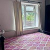 Photo 5: Double bed, window opends at the back garden of the house.