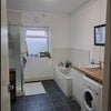 Photo 4: Huge downstairs bathroom with washing machine