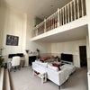 Photo 7: Living Room with kitchen above
