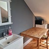 Photo 2: One side of attic room
