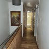 Photo 5: hallway to family bathroom