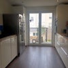 Photo 8: The kitchen and door to the garden