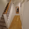 Photo 3: entrance and ground floor corridor 