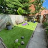 Photo 9: Garden area low maintenance Astroturf